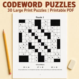 Op de afbeelding: Een printbare codewoordpuzzelpagina getiteld Puzzle 1 met een raster van genummerde vakjes, sommige gevuld met de letters A, E en N. Onder het raster staat de tekst: Given letters: 15 = A, 17 = E, 23 = N. Een geel potlood en een witte gum zijn aanwezig.