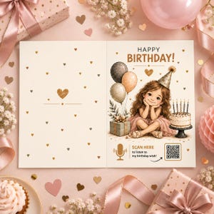 May include: A birthday greeting card featuring a brown-haired child wearing a party hat, sitting beside a cake with candles, balloons, and a gift. The text reads HAPPY BIRTHDAY! and SCAN HERE to listen to my birthday wish! with a QR code icon.