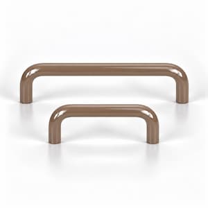 May include: Two smooth, glossy, light brown cabinet pulls with a simple U-shaped design. The larger handle is positioned behind the smaller handle, both featuring rounded ends and a uniform, solid color finish with reflective highlights.