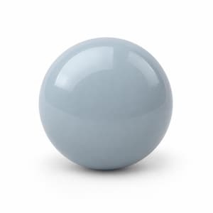 May include: A smooth, solid sphere with a glossy, light blue-grey finish. The object has a perfectly round shape and a reflective surface that catches light, creating a bright highlight on the upper portion of the sphere against a plain background.