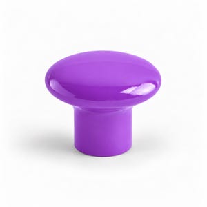 May include: A solid purple cabinet knob with a smooth, glossy finish. The knob features a wide, rounded top surface that tapers down into a cylindrical base, creating a mushroom-like shape. The vibrant purple colour is consistent throughout.