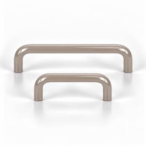 May include: Two smooth, taupe-coloured cabinet pulls with a rounded, U-shaped design. The hardware features a glossy finish and a simple, curved silhouette. One pull is significantly longer than the other, both showing a consistent tubular shape.