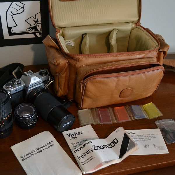 Vintage Asahi Pentax K1000 Camera, T'Brozzi Inc Leather Camera Bag, Vivitar & Albinar Lenses, and Vivitar Flash/Vintage Camera Set