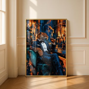 May include: A framed wall art print featuring an anthropomorphic leopard dressed in a formal black tuxedo with a white shirt and bow tie. The leopard sits in a chair, holding a cigar, with a glass of amber liquid on a table nearby.
