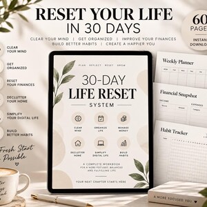 May include: A digital tablet displaying a 30-day life reset system workbook with 60 pages. The screen shows text including Reset Your Life In 30 Days, icons for organization, and botanical illustrations. Printed planner pages for weekly, financial, and habit tracking are visible.