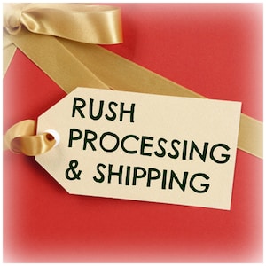 May include: A red gift box with a gold ribbon and a tag that says "RUSH PROCESSING & SHIPPING".