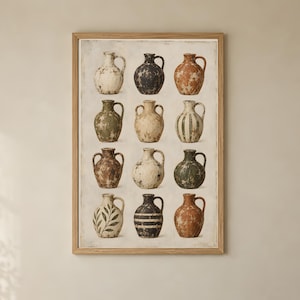 May include: A framed wall art print featuring a grid of twelve ceramic jugs in various colors and textures, including cream, black, terracotta, and green. The vessels display distressed finishes, with some featuring stripes or leaf patterns.