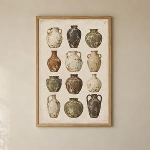 May include: A framed wall art print featuring a grid of twelve ceramic vases in various shapes and sizes. The vases display a weathered, distressed finish in earthy tones including cream, brown, dark gray, and muted green, set against a light background.