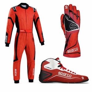 May include: A red and black Sparco racing suit, a matching red and black racing glove with the text "S" and "Sparco" printed on it, and a red, white, and black racing shoe with the text "K-POLE" and "Sparco" visible on the side.