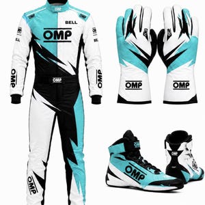 May include: A racing suit, a pair of gloves, and a pair of high-top racing shoes in a white, black, and light blue color scheme. The suit, gloves, and shoes all feature the OMP brand logo prominently displayed in black text on their surfaces.