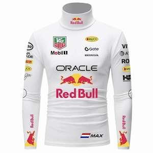 May include: A white long-sleeve turtleneck shirt featuring various sponsor logos including Oracle, Red Bull, TAG Heuer, Mobil 1, Honda, and Rauch. The front displays the Red Bull logo and text, with a small Dutch flag and the name MAX near the hem.