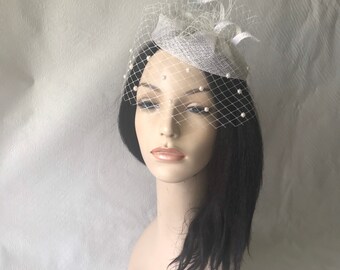 White Bridal fascinator hat with pearl dotted veil, ladies tea party hat, vintage styled wedding hat, sinamay fascinator