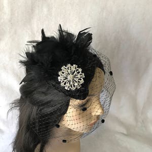 Black mini fascinator hat with dotted veil, feather headpiece, mini hat, weddings, tea party, christenings, funeral, cocktail, toddler girl