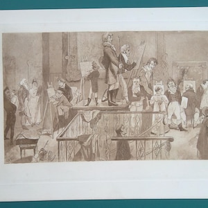 Op de afbeelding: Sepia-kleurendruk die een drukke kunststudio laat zien. Verschillende figuren verzamelen zich rond ezels en een centraal beeld, bezig met artistieke activiteiten. De prent is omlijst met een witte rand.