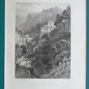 May include: An antique black and white print depicting a European landscape with a building complex nestled in a valley. The print features a church with a domed roof, surrounded by trees and mountains. The title "CONVENT OF LA SANTA TRINITA" is visible.