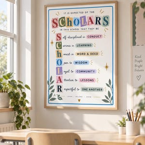 May include: A framed wall poster featuring the text IT IS EXPECTED OF THE SCHOLARS IN THIS SCHOOL THAT THEY BE, followed by an acrostic for SCHOLAR listing traits like self-disciplined in CONDUCT, curious in LEARNING, and respectful to ONE ANOTHER.