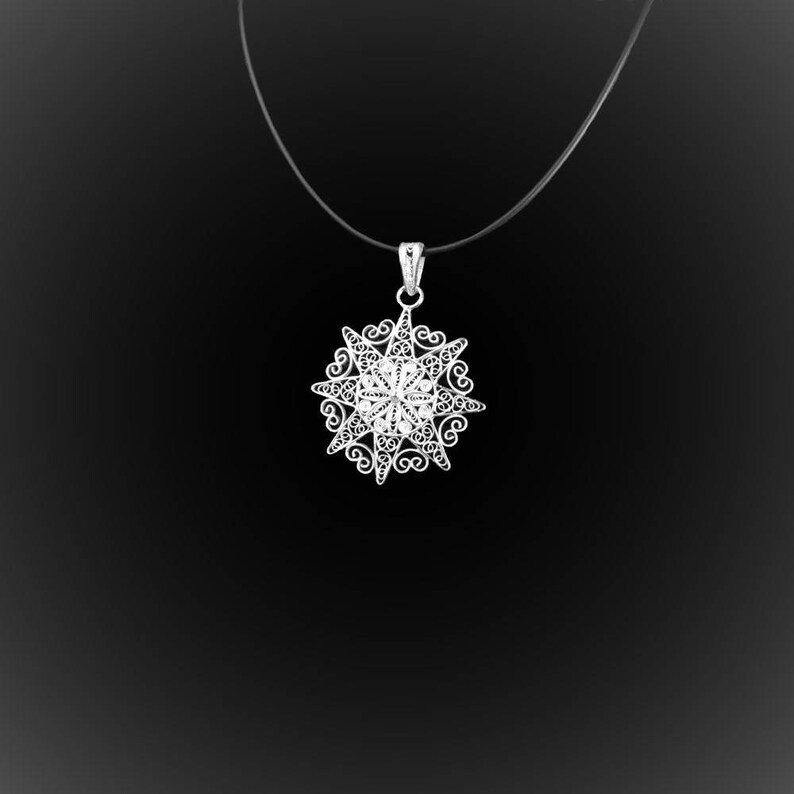 Shining Sun pendant with silver embroidery