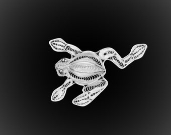 Frog brooch in silver embroidery