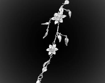 Bracelet Petal of love in silver embroidery
