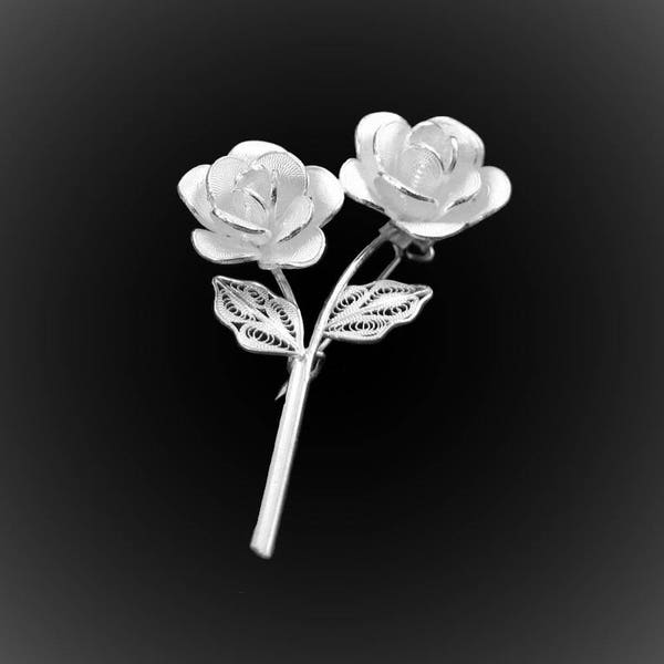 Broche Rose des vents en broderie d'argent