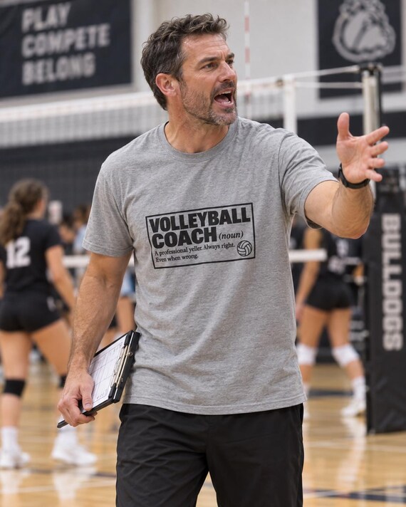 Volleyball coach calling the play courtside wearing funny Volleyball Coach definition tee