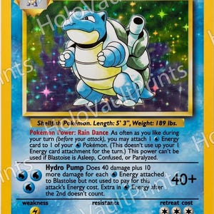 May include: A Blastoise trading card featuring a blue, bipedal turtle creature with two water cannons on its shell. The card displays 100 HP, the Rain Dance Pokémon Power, and the Hydro Pump attack. It includes text details like length 5' 3" and weight 189 lbs.