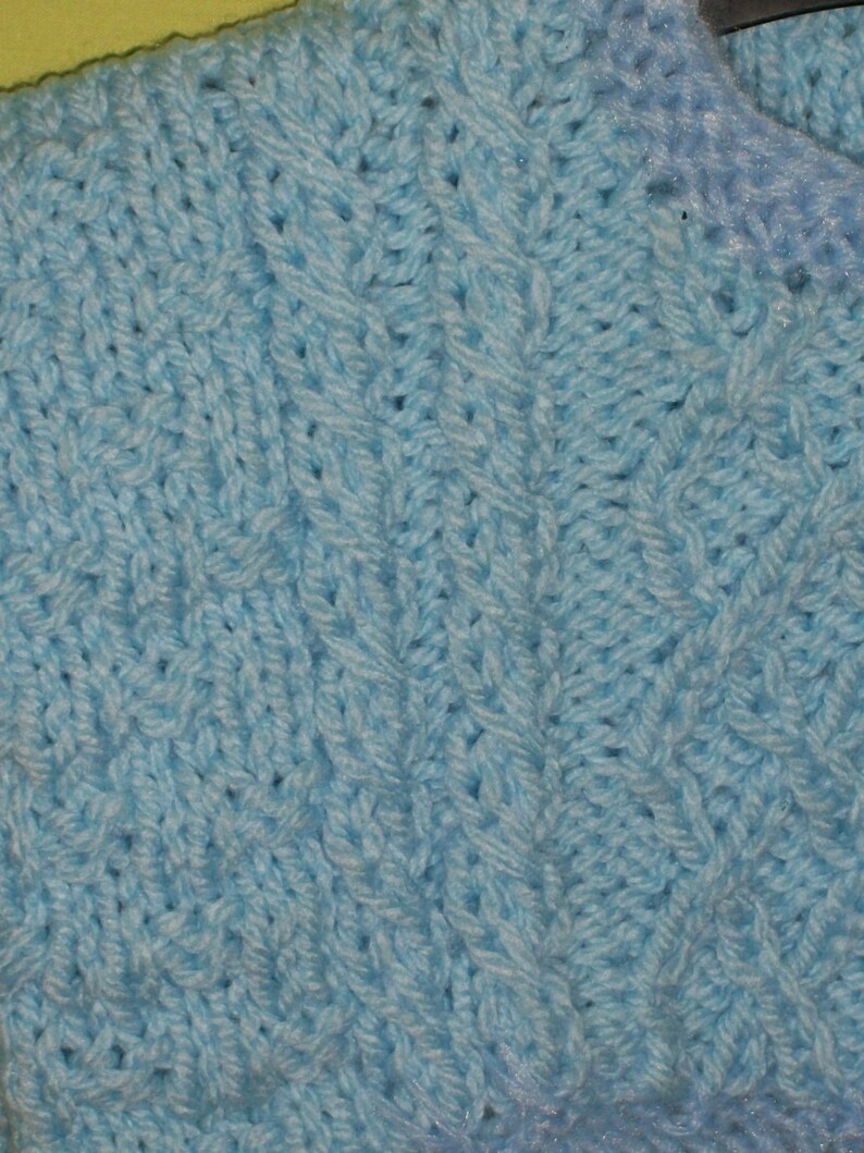 Sale item Blue chunky jumper with cabled patterns for 6 to 9 month old
