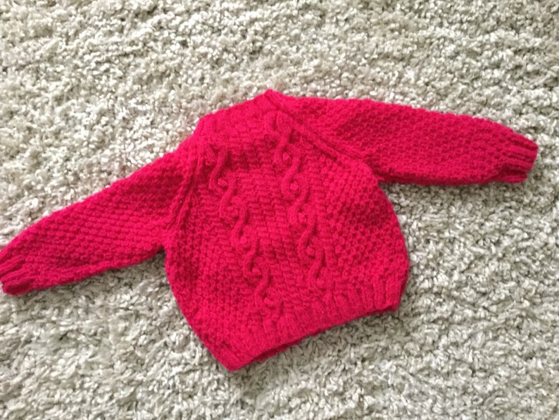Bright cerise cabled aran cardigan with vintage metal buttons