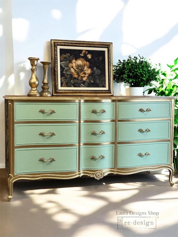 green gold dresser Bold & beautiful! This dark green dresser with gold hardware is the statement piece your home's been waiting for. Don't miss it at River City!
