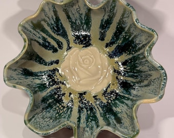 Uniquely shaped bowl with rose