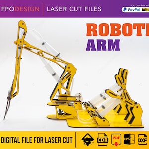 Peut inclure: Un modèle de bras robotique en bois découpé au laser jaune, doté de seringues en plastique transparent reliées par des tubes pour le mouvement hydraulique. Le texte "ROBOTIC ARM" apparaît en grandes lettres orange et violettes.