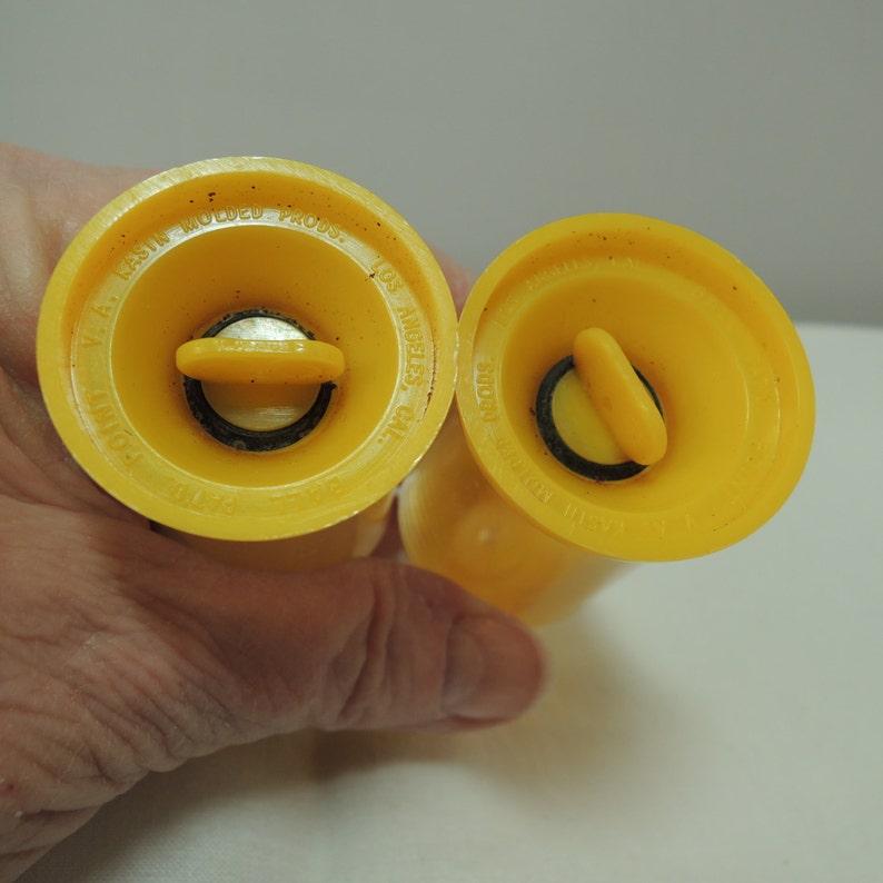 Vintage Bullet shaped Salt and Pepper Shakers Atomic Beautiful condition Yellow and clear plastic