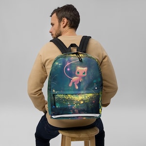 May include: A backpack featuring a graphic print of a pink creature with large blue eyes and a long tail, set against a dark, glowing forest background with bokeh light effects. The bag has black straps and a front zippered pocket compartment.