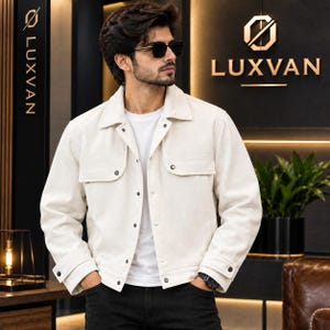 May include: An off-white button-down jacket with a pointed collar, two chest pockets with flaps, and long sleeves with buttoned cuffs. The jacket is worn over a plain white t-shirt and black pants. The LUXVAN logo is visible in the background.