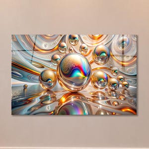 May include: A rectangular wall art piece featuring a series of metallic, spherical orbs in varying sizes. The spheres display a spectrum of iridescent colors, including gold, blue, and magenta, set against a swirling, liquid-like abstract background.