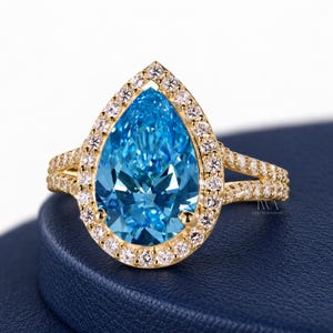 Blue Pear Lab Grown Diamond Halo Engagement Ring with Split Shank Pavé Band