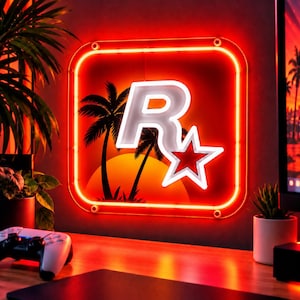May include: A square neon sign featuring a white letter R and a red star logo against a sunset background with silhouettes of palm trees. The sign is framed by a glowing red border, creating a vibrant display of light and color.