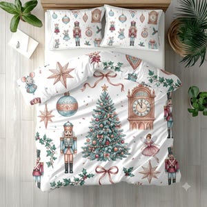 May include: A white bedding set featuring a repeating Christmas pattern of nutcrackers, mice, grandfather clocks, ornaments, stars, and holly. The design includes a central Christmas tree surrounded by ribbons, fairy figures, and festive holiday motifs.