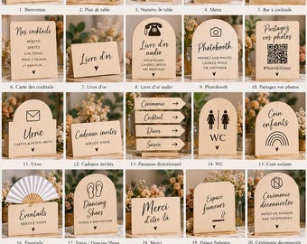 Peut inclure: Une collection de vingt panneaux de mariage en bois clair avec des formes variées et du texte imprimé en noir, incluant des étiquettes pour l'accueil, les numéros de table, le menu, le bar, le livre d'or, le photobooth et la signalétique.