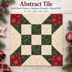 Op de afbeelding: Een vierkant quiltblokpatroon genaamd Abstract Tile, bestaande uit een raster van stoffen vierkanten in rood met gouden sneeuwvlokken, donkergroen met dennennaalden en rode bessen, en crème met gouden bladeren, verkrijgbaar in 4, 8, 10, 12 en 16 inch.