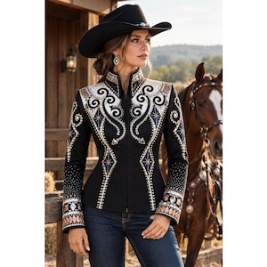 May include: A black long-sleeve jacket featuring a high collar and a front zipper closure. The jacket is adorned with intricate white, silver, and copper-toned embroidery, geometric patterns, and sparkling crystal accents along the chest and sleeves.