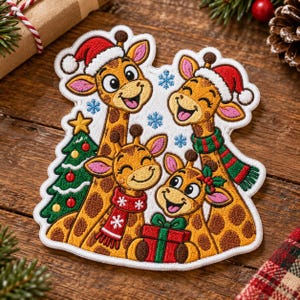 May include: An embroidered patch featuring four yellow giraffes with brown spots. Two giraffes wear red Santa hats, one wears a red and white snowflake scarf, and one wears a red and green striped scarf. A green Christmas tree and a red gift are included.