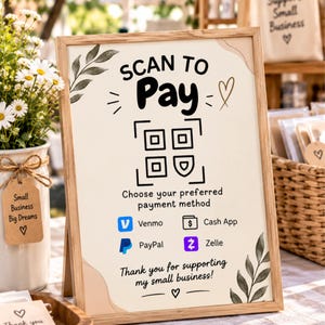 Puede incluir: Un letrero con marco de madera y fondo crema que muestra el texto SCAN TO Pay, un código QR e iconos de pago para Venmo, Cash App, PayPal y Zelle. El letrero incluye ilustraciones botánicas y el texto Thank you for supporting my small business!