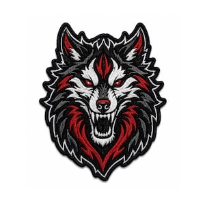 May include: An embroidered patch featuring a stylised wolf head with a snarling expression. The design uses a colour palette of black, white, and red, with sharp, pointed ears, bared teeth, and intense red eyes, all outlined in a thick black border.