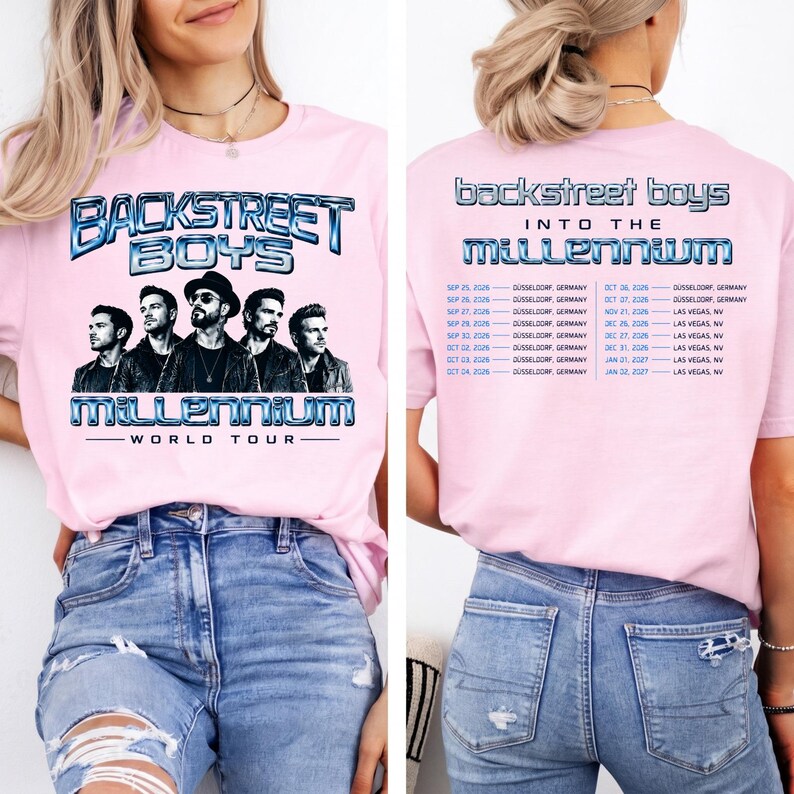 May include: A light pink t-shirt featuring a graphic of the Backstreet Boys with the text Backstreet Boys Into The Millennium World Tour on the front and a list of tour dates and locations in Dusseldorf and Las Vegas printed on the back.