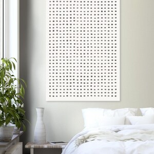 May include: A rectangular wall art print featuring a white background with a repeating pattern of small, vertical black dashes arranged in uniform horizontal rows and vertical columns across the entire surface of the print.