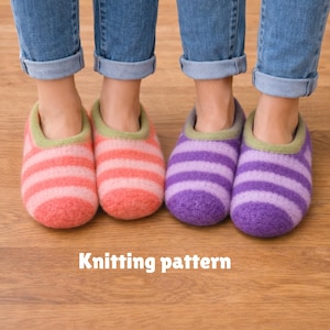 May include: Two pairs of slippers with horizontal stripes in shades of pink and purple, featuring a light green trim around the opening. The text Knitting pattern is displayed at the bottom. The slippers are worn with blue cuffed denim jeans.