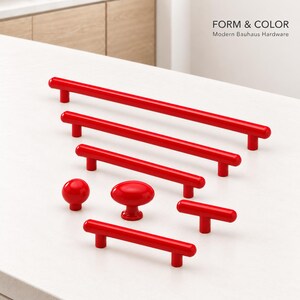 Rote Schrankknöpfe und Schubladengriffe, moderne Bauhaus-Beschläge, farbenfrohe Griffe für Küchenschränke, Kommoden und Schränke