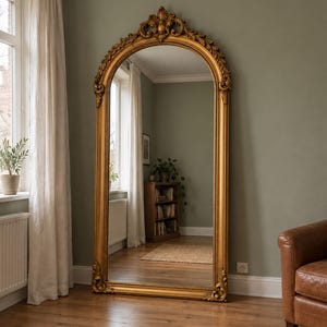Standing gold arch mirror