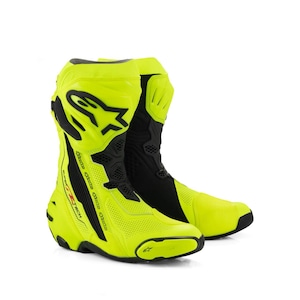 May include: A pair of neon yellow and black motorcycle racing boots featuring perforated panels, a prominent black Alpinestars logo on the shin guard, and the text Supertech printed in red and yellow on the side of the protective heel structure.